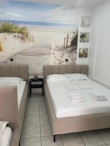 Postel nebo postele na pokoji v ubytování Spile Rooms Lukas