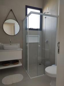 Ένα μπάνιο στο Casa 1 Beach Owl Residence