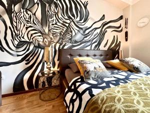 Posteľ alebo postele v izbe v ubytovaní Africa Apartment