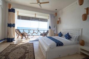 ザンジバルシティにあるRoyal Cliff Zanzibarのベッドルーム1室(ベッド1台付)が備わります。