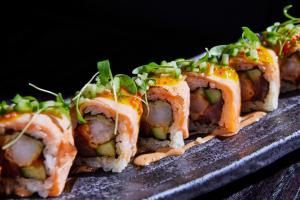 a group of sushi dishes sitting on a plate at Mandarin Oriental Mayfair, London in London