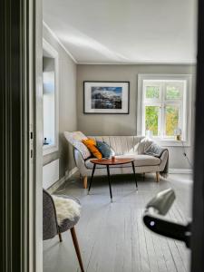 Гостиная зона в Husly Reine - your home with Reinebringen view