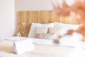 Posteľ alebo postele v izbe v ubytovaní Hotel Sněžné