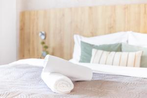 Posteľ alebo postele v izbe v ubytovaní Hotel Sněžné