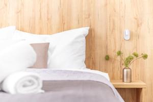 Posteľ alebo postele v izbe v ubytovaní Hotel Sněžné