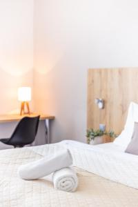 Posteľ alebo postele v izbe v ubytovaní Hotel Sněžné