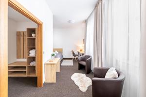 Posedenie v ubytovaní Hotel Sněžné