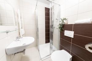 Kúpeľňa v ubytovaní Hotel Sněžné
