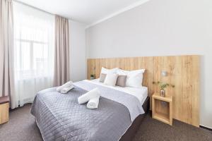 Posteľ alebo postele v izbe v ubytovaní Hotel Sněžné