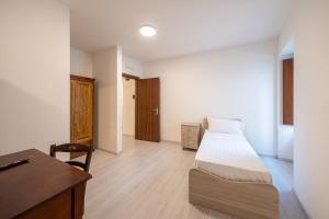Postel nebo postele na pokoji v ubytování Albergo Diffuso Borgo La Terra