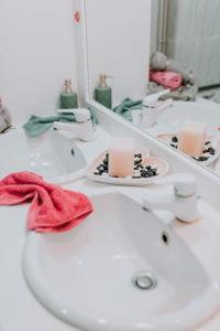 a bathroom with a white sink and a mirror at tony's house in Kámpos +15 photos