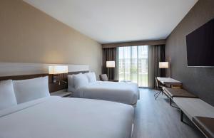 Postel nebo postele na pokoji v ubytování AC Hotel by Marriott Waco Downtown