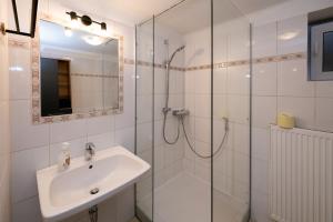 Koupelna v ubytování L&P Appartement Klagenfurt + 31 fotografií