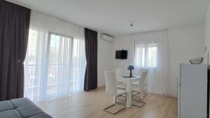 TV a/nebo společenská místnost v ubytování Apartments MISTEMI