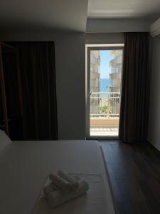 Postel nebo postele na pokoji v ubytování Hotel Adria