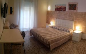 Cama o camas de una habitación en Casa Piazza del Santo