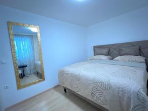 Postel nebo postele na pokoji v ubytování Apartments Villa Slavica