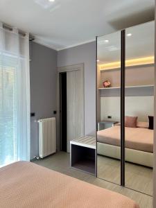 Postel nebo postele na pokoji v ubytování Real Rooms Dalia