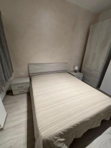 Postel nebo postele na pokoji v ubytování Bianca Appartamenti Bilocale