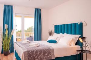 Кровать или кровати в номере Hotel SOL