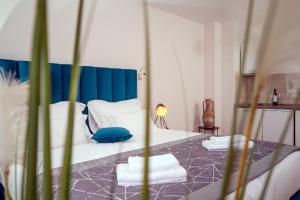Кровать или кровати в номере Hotel SOL