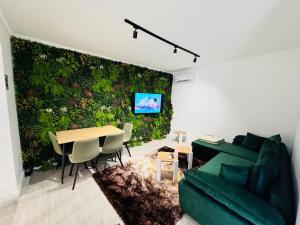 Posezení v ubytování Green Luxe Suites