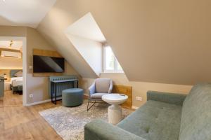 Posezení v ubytování Lepke Apartmanház és Étterem