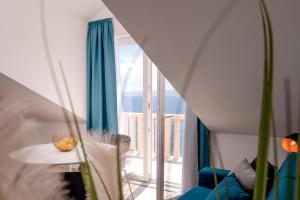 Кровать или кровати в номере Hotel SOL
