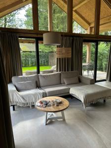 Posezení v ubytování Chalet Hoge Kempen