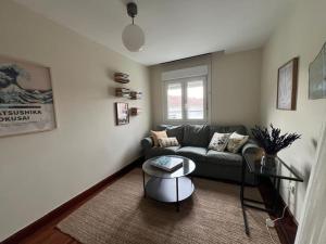 Posezení v ubytování Coqueto apartamento junto al mar