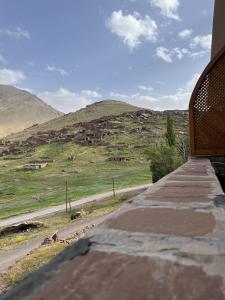 a view of a mountain from a balcony of a house at dar assaka in Oukkainrdem