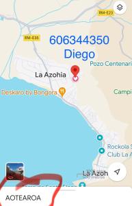 Un mapa de Puerto Escondido con un marcador rojo en AOTEAROA, en La Azohía