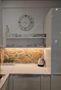 A kitchen or kitchenette at Villa Musa with private pool