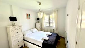 Posteľ alebo postele v izbe v ubytovaní 8 Bungalow familiar con Piscina Gran Alacant + 37 fotografií