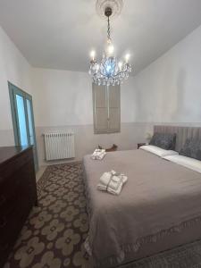 Postel nebo postele na pokoji v ubytování Aporti Home + 11 fotografií