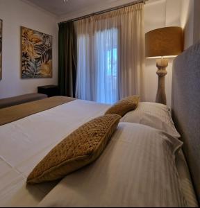 A bed or beds in a room at Villa Musa with private pool