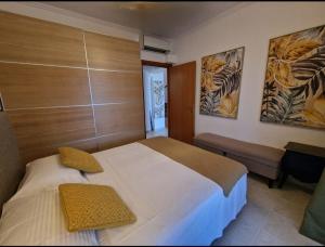 A bed or beds in a room at Villa Musa with private pool