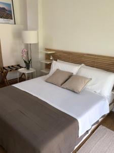 Katil atau katil-katil dalam bilik di Villa Ribaudo Relax