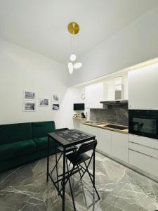 Η κουζίνα ή μικρή κουζίνα στο Dimora in pieno centro +19 φωτογραφίες