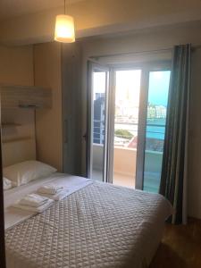 Postel nebo postele na pokoji v ubytování Apartments Rafailović Ljubo