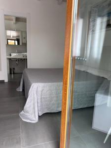 Postel nebo postele na pokoji v ubytování Longevity Hotel