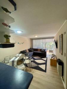 Posezení v ubytování Amplio departamento en Mirasol