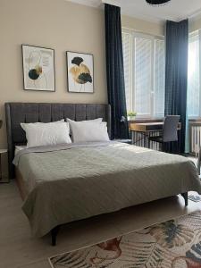 Postel nebo postele na pokoji v ubytování EL apartment