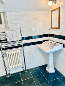 Koupelna v ubytování Tythe Barn Cottage