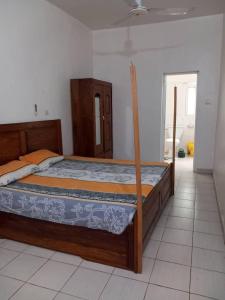 Postel nebo postele na pokoji v ubytování Appartement dans le quartier ACI à Bamako avec panneaux solaires