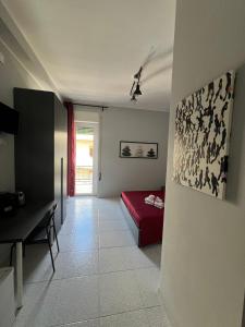 TV a/nebo společenská místnost v ubytování Settetrequattro Rooms