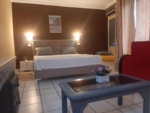 Posezení v ubytování Hotel Le Khalife