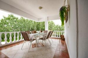Balkón nebo terasa v ubytování Villa De Flores