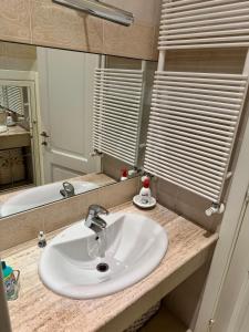 a bathroom with a sink and a mirror at MAISON del MARE TERMOLI CB in Termoli +23 photos