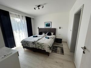Łóżko lub łóżka w pokoju w obiekcie Villa Korina , Pomer